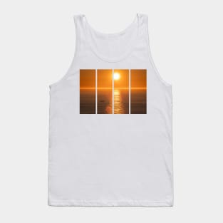 Wonderful landscapes in Norway. Nord-Norge. Beautiful scenery of a midnight sun sunset at Nordkapp (Cape North). Boat and globe on a cliff. Rippled sea and clear orange sky. Tank Top